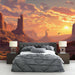 Une chambre moderne avec un papier peint représentant un paysage désertique au coucher de soleil, aux teintes chaudes et apaisantes, évoquant une ambiance sereine et naturelle.