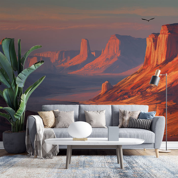 Une pièce de vie moderne avec un papier peint représentant un paysage désertique aux teintes chaudes et orangées, évoquant une ambiance naturelle et apaisante.