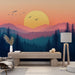 Une pièce moderne avec un papier peint représentant un paysage de montagne au coucher de soleil, dégradé de rose et orange, créant une atmosphère apaisante et naturelle.