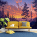 Un salon moderne avec un papier peint représentant un paysage de montagne au coucher de soleil, mêlant des teintes violettes et orangées pour une ambiance apaisante et naturelle.