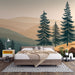 Une chambre moderne avec un papier peint représentant des montagnes et des sapins dans des teintes douces de vert et beige, créant une atmosphère apaisante et naturelle.