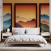 Une chambre moderne avec un papier peint représentant des montagnes aux dégradés de bleu, orange et jaune, créant une atmosphère chaleureuse et apaisante.