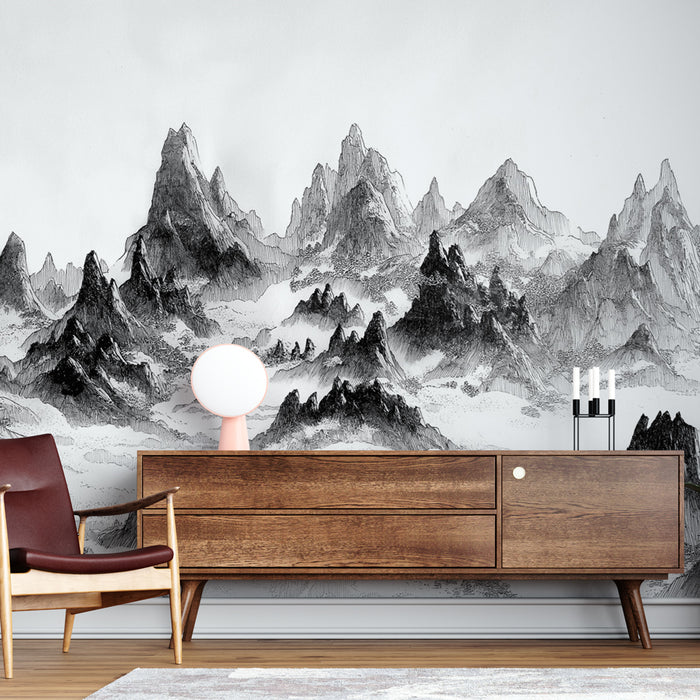 Une pièce moderne avec un papier peint représentant des montagnes en noir et blanc, créant une atmosphère artistique et apaisante.
