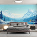 Une chambre moderne avec un papier peint représentant un paysage montagneux apaisant aux teintes bleues et blanches, évoquant la sérénité et la nature.