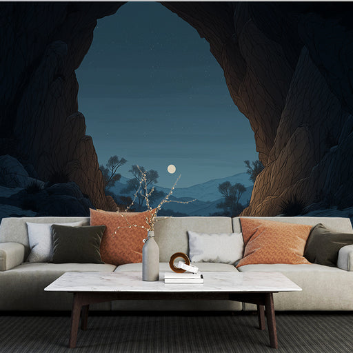 Un salon contemporain avec un papier peint représentant une vue nocturne de montagnes et d'un ciel étoilé, créant une atmosphère sereine et apaisante.