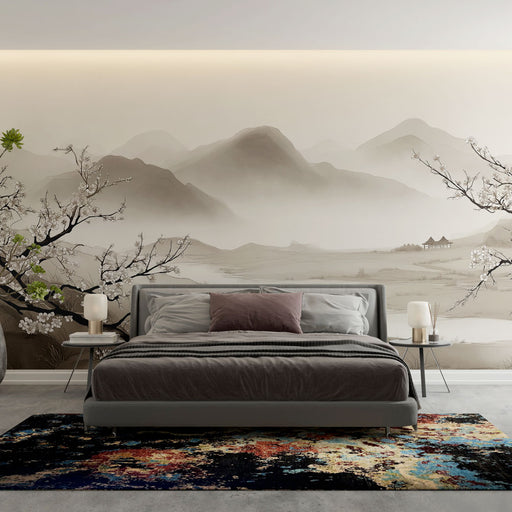 Une chambre élégante avec un papier peint représentant un paysage asiatique en nuances de beige et gris, créant une atmosphère sereine et apaisante.