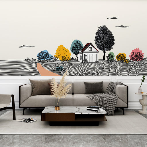 Un salon moderne avec un papier peint illustratif représentant une maison entourée de collines et d'arbres colorés, créant une ambiance chaleureuse et accueillante.