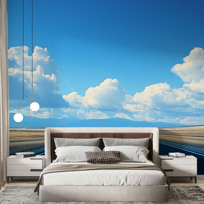 Une chambre moderne avec un papier peint représentant un ciel bleu lumineux parsemé de nuages blancs, créant une atmosphère sereine et apaisante.