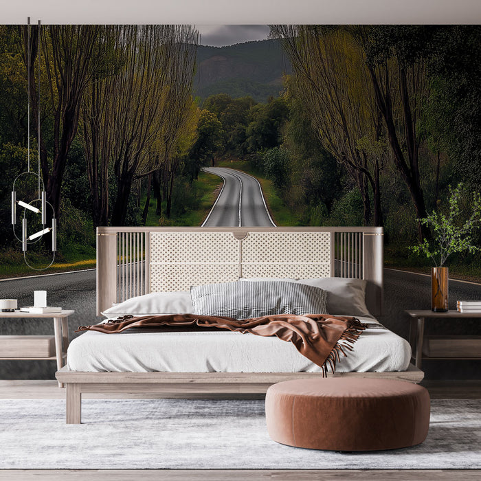Une chambre moderne avec un papier peint représentant une route sinueuse bordée d'arbres, créant une atmosphère apaisante et immersive.