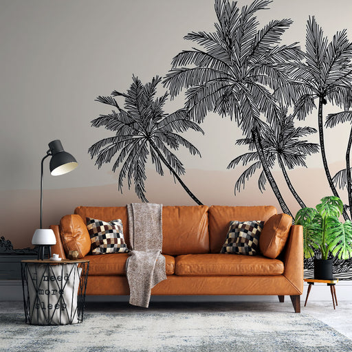Un salon moderne avec un papier peint représentant des palmiers en noir sur un fond dégradé beige, créant une ambiance tropicale et apaisante.