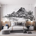 Une chambre moderne avec un papier peint représentant un paysage tropical en noir et blanc, évoquant une atmosphère sereine et apaisante.