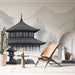 Une pièce moderne avec un papier peint représentant un pavillon asiatique en noir et blanc, évoquant une atmosphère sereine et minimaliste.