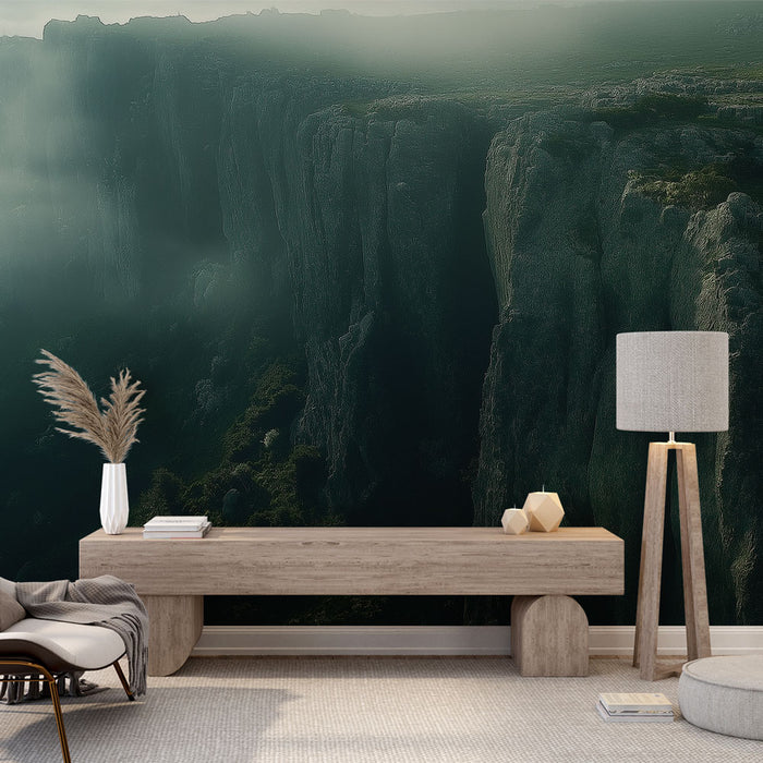 Une pièce moderne avec un papier peint représentant des falaises sombres et brumeuses, créant une atmosphère mystérieuse et apaisante.