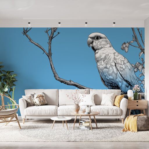 Une pièce moderne avec un papier peint représentant un perroquet stylisé sur fond bleu, créant une ambiance artistique et vivante.