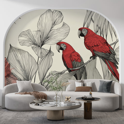 Une pièce moderne avec un papier peint tropical représentant des perroquets rouges et des feuilles délicates sur fond clair, créant une atmosphère vivante et accueillante.