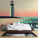 Papier peint mural avec phare stylisé sur plage sereine sous ciel pastel pour chambre moderne
