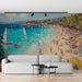 Une pièce de vie moderne avec un papier peint artistique représentant une plage animée aux couleurs vives, évoquant une atmosphère estivale et joyeuse.