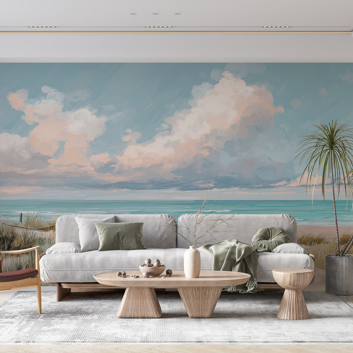 Une pièce lumineuse avec un papier peint représentant un paysage marin apaisant, où des nuages roses flottent au-dessus d'une mer turquoise, créant une ambiance sereine et relaxante.