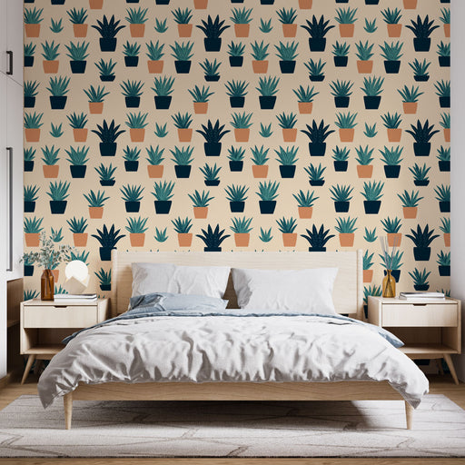 Une chambre moderne avec un papier peint aux motifs de plantes en pots, mêlant des teintes vertes et terracotta sur fond clair, créant une ambiance chaleureuse et naturelle.