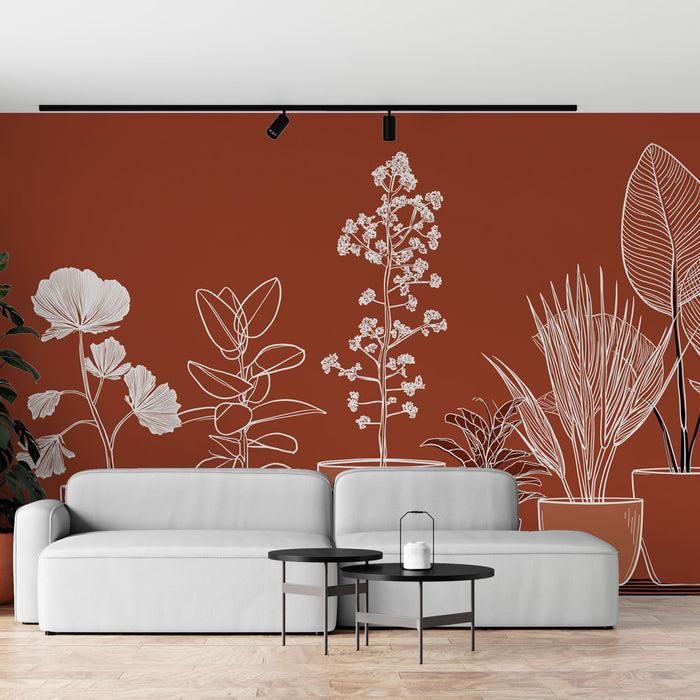 Un salon moderne avec un papier peint terracotta illustré de motifs floraux et botaniques en blanc, créant une ambiance chaleureuse et accueillante.