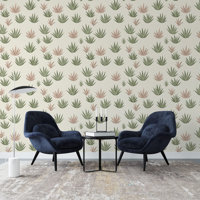 Un salon moderne avec un papier peint aux motifs de plantes stylisées dans des teintes douces de vert et de rose, créant une atmosphère apaisante et naturelle.