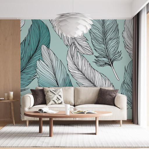Un salon moderne avec un papier peint représentant de grandes feuilles stylisées en noir et turquoise sur fond mint, créant une ambiance fraîche et apaisante.
