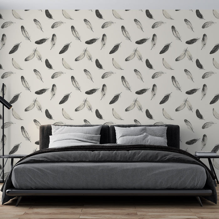 Une chambre moderne avec un papier peint délicat représentant des plumes noires et grises sur fond clair, créant une atmosphère apaisante et élégante.