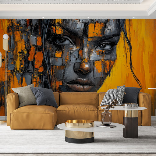 Papier peint artistique avec visage stylisé en tons orange et gris pour salon moderne.