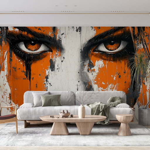 Papier peint artistique avec visage stylisé en orange et noir pour salon moderne.