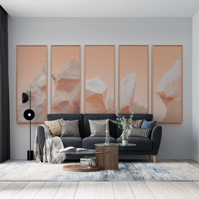 Un salon moderne avec un papier peint représentant des roches stylisées sur fond rose, créant une ambiance douce et apaisante.