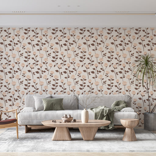 Un salon moderne avec un papier peint floral aux roses délicates sur fond clair, créant une ambiance douce et accueillante.