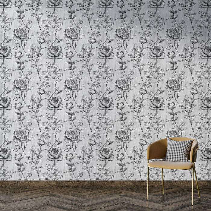 Une pièce élégante avec un papier peint floral noir et blanc représentant des roses délicates, créant une atmosphère romantique et intemporelle.