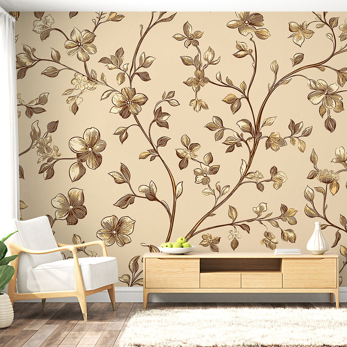 Une salle de séjour avec un papier peint floral beige et doré, illustrant des branches élégantes et des fleurs délicates, créant une ambiance chaleureuse et raffinée.