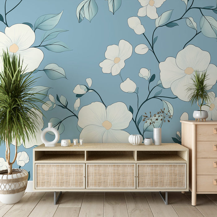 Une pièce lumineuse avec un papier peint floral bleu clair orné de grandes fleurs blanches et de feuillages délicats, créant une atmosphère apaisante et élégante.