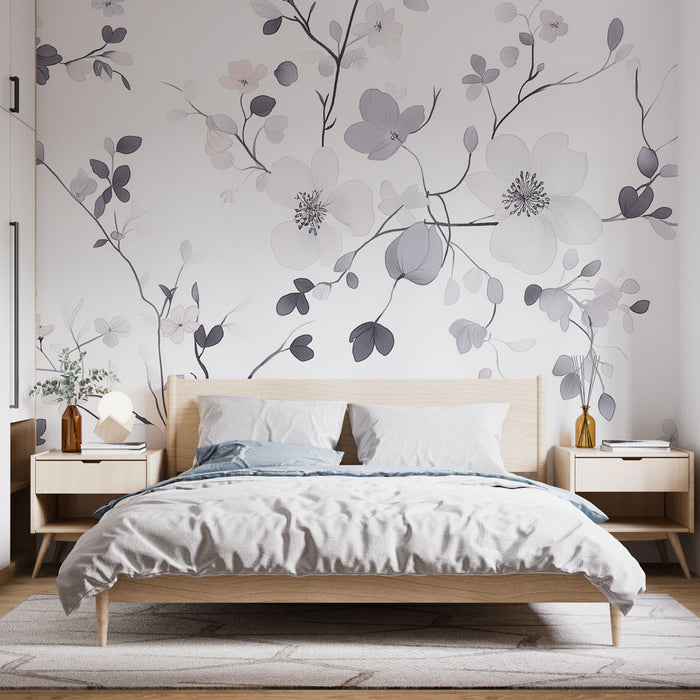 Une chambre moderne avec un papier peint floral aux teintes douces de gris et rose, créant une atmosphère délicate et apaisante.