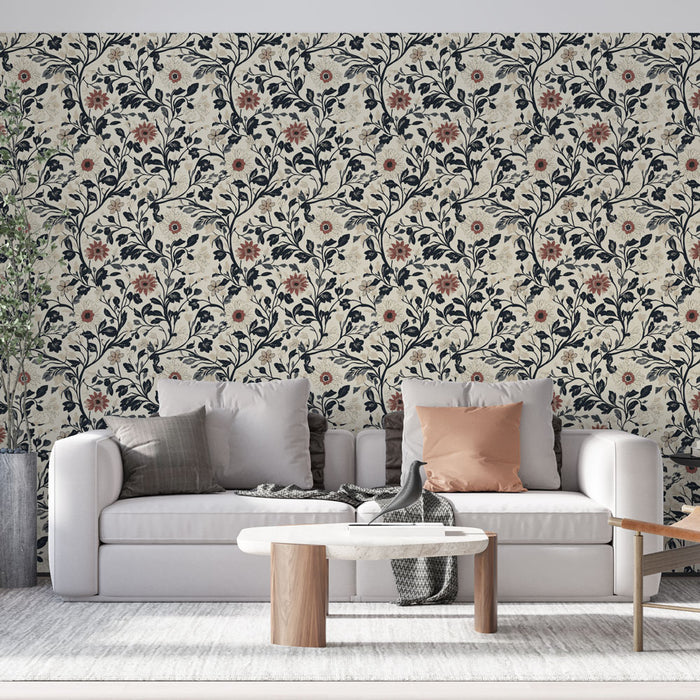 Un salon moderne avec un papier peint floral aux motifs délicats de fleurs rouges et bleues sur fond crème, créant une ambiance chaleureuse et accueillante.