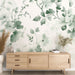 Une pièce moderne avec un papier peint floral vert pastel aux motifs délicats de fleurs et de feuillages, créant une ambiance douce et apaisante.