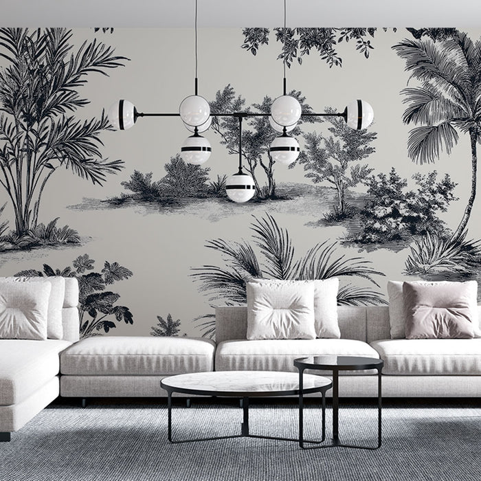 Un salon moderne avec un papier peint représentant des paysages tropicaux en noir et blanc, créant une atmosphère élégante et apaisante.