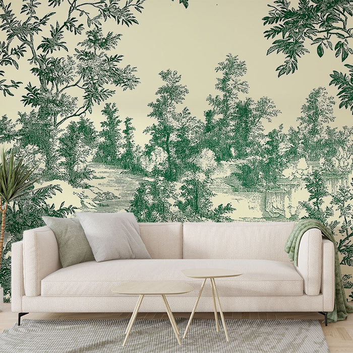 Un salon élégant avec un papier peint représentant un paysage bucolique en vert sur fond crème, créant une atmosphère apaisante et naturelle.