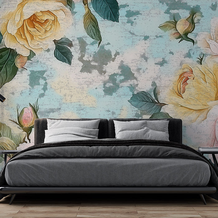 Une chambre moderne avec un papier peint floral aux roses jaunes et aux feuilles vertes sur un fond bleu pastel, créant une atmosphère douce et romantique.