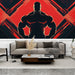 Un salon contemporain avec un papier peint dynamique représentant une silhouette musclée sur fond rouge et noir, créant une ambiance énergique et audacieuse.