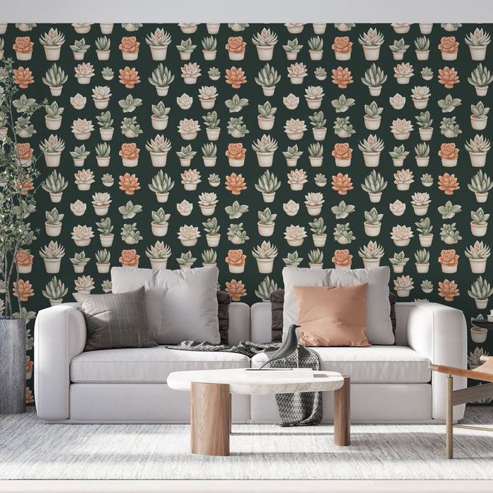 Un salon moderne avec un papier peint représentant des succulentes colorées dans des pots sur fond vert foncé, créant une atmosphère chaleureuse et naturelle.