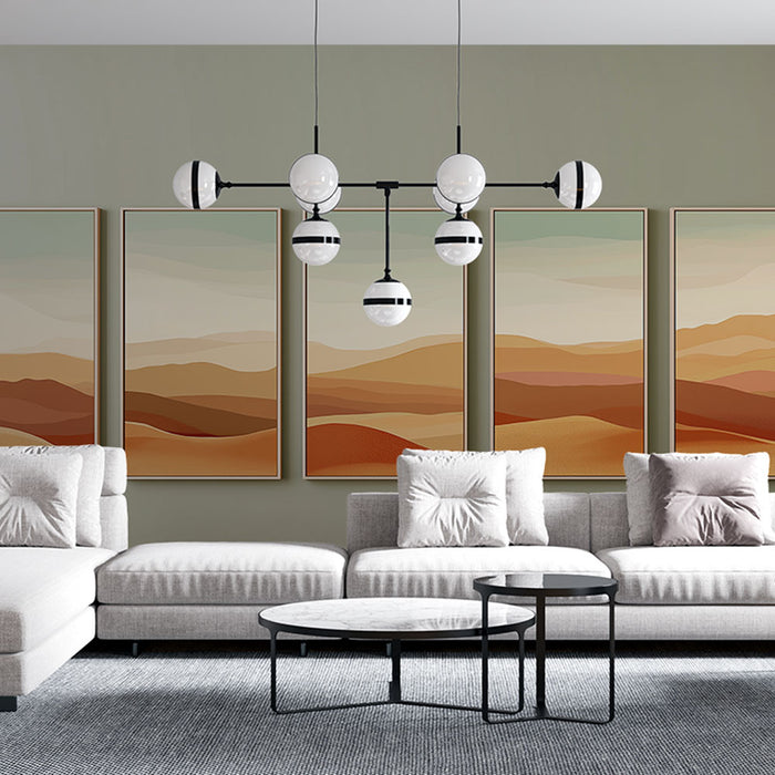 Un salon moderne avec un papier peint aux teintes douces et chaudes, représentant des paysages abstraits en dégradés de beige, orange et rouge, créant une atmosphère chaleureuse et accueillante.