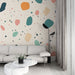 Papier peint terrazzo avec motifs colorés et modernes pour salon contemporain