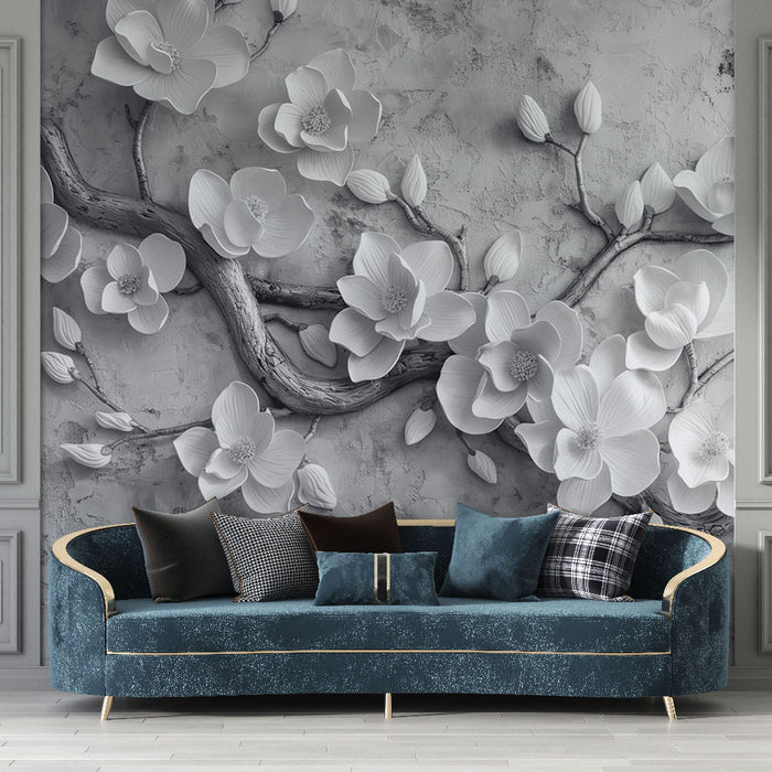 Une pièce moderne avec un papier peint en relief représentant des fleurs blanches et des branches sur fond gris, créant une atmosphère élégante et apaisante.