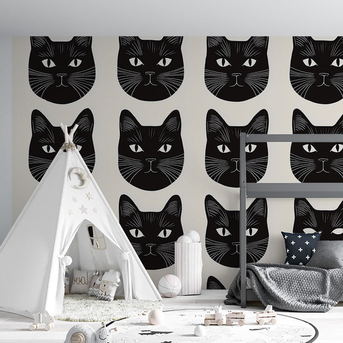 Papier peint têtes de chat | Motif graphique de visages de chats noirs stylisés sur fond crème