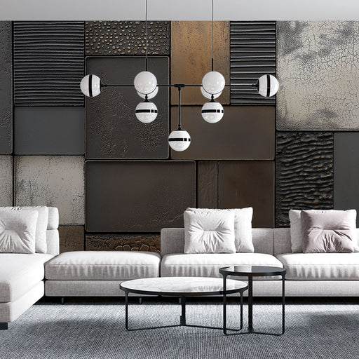 Papier peint moderne avec panneaux décoratifs en tonalités sombres et textures variées pour salon élégant