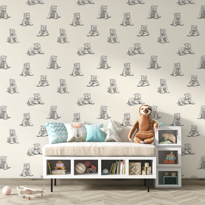 Un salon accueillant avec un papier peint illustré de petits ours en peluche sur fond clair, créant une ambiance ludique et chaleureuse.