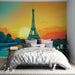 Papier peint panoramique Tour Eiffel avec coucher de soleil vibrant sur la Seine pour chambre moderne