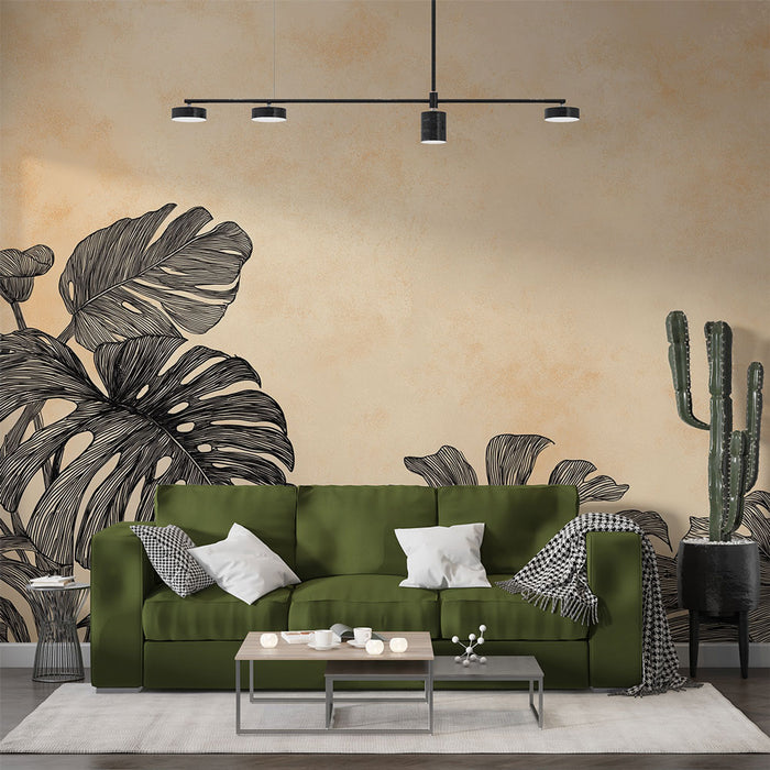 Un salon moderne avec un papier peint représentant de grandes feuilles tropicales noires sur un fond beige, créant une atmosphère chaleureuse et accueillante.